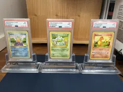[PSA 9] 1999 Pokemon 1st Edition Base Set Starter Trio Squirtle Bulbasaur Charm - Image 1