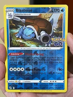 POKEMON BLASTOISE #017/078 RARE REVERSE HOLOFOIL POKEMON GO NM CARD - Image 1