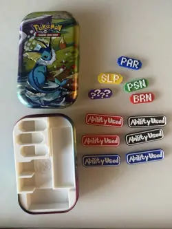 Vaporeon Prismatic Evolution Tin + Custom TCG Markers Pokemon - Image 2