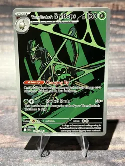 Team Rocket's Spidops 187/182 IR SV10: Destined Rivals Pokemon Card - Image 1