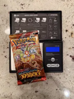 VERY HEAVY!! (22.39g) Pokemon Surging Sparks – Factory Sealed Booster Pack - Image 1