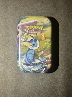 Pokemon TCG: S&V Prismatic Evolutions Vaporeon Mini Tin (2 Packs) New & Sealed - Image 1