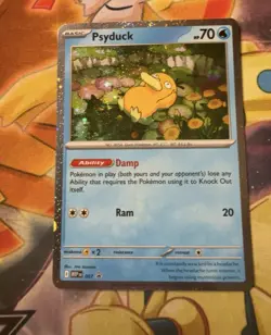 Pokemon TCG Mega Evolutions Psyduck 007 Black Star Promo Card SWIRL! NM - Image 1