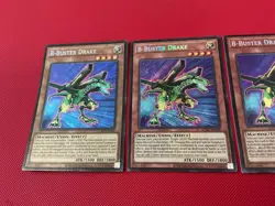 3x B-Buster Drake - Secret Rare - LCKC-EN020 - Unlimited Ed NM Foil Bleed - Image 3