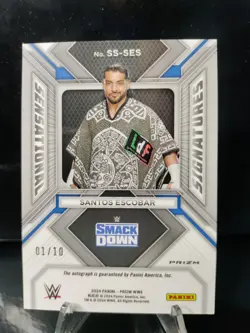 2024 Panini Prizm WWE Santos Escobar Sensational Signatures Auto GOLD 1/10 - Image 2