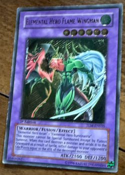 Yu-Gi-Oh! Elemental Hero Flame Wingman TLM-EN035 1st Edition Super Rare Holo LP - Image 1