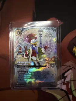 Disney Lorcana Winterspell Enchanted Scrooge McDuck, Reformed Ebenezer 235/204 - Image 1