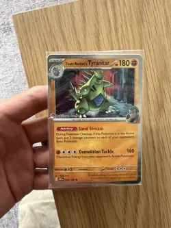 Team Rocket’s Tyranitar 096/182 Promo Pokemon TCG Card Center Stamp Sealed - Image 1
