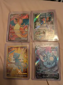 Pokemon Card Lot Of 4 Rare Cards Charizard, Charmander, Mew And Vaporeon - Image 1