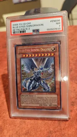 Blue-Eyes Shining Dragon RP02-EN096 Retro Pack 2 Unlimited Near Mint PSA 7 - Image 1