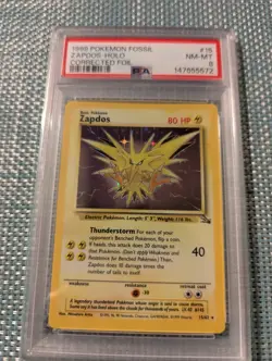 1999 Pokemon Fossil Zapdos-Holo Unlimited PSA 8 - Image 1