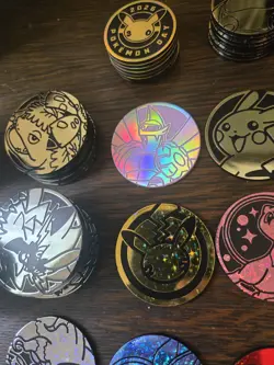 170 Official Pokemon Coin Lot Various Sets and Styles Eevee Pikachu Charizard - Image 5