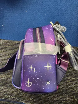 Loungefly Disney Treasure Planet Solar Surfer Glow-in-the-Dark Mini Backpack - Image 3
