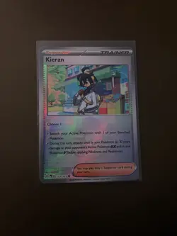 Pokemon TCG - Pokeball Holo Kieran Trainer Prismatic Evolutions - 113/131 - - Image 1