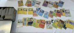 Pokemon Card Lot 2500 Common/Uncommon, Holo included Plus Four Collectible Tins - Image 4