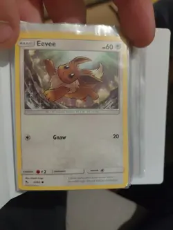 Eevee And Eeveelutions Cards X15 In Tyranitar Mini Binder - Image 1