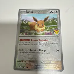 Eevee [Pokemon Day] 74/131 Prismatic Evolutions Common NM - Image 1