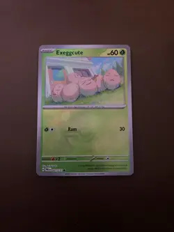 Pokemon TCG Exeggcute 001 131 Holo Card Prismatic Evolutions - Image 1