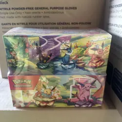 Pokemon TCG Scarlet & Violet Prismatic Evolutions Mini Tin Display Box SPANISH V - Image 1