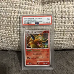 2009 POKEMON JPN ADVENT OF ARCEUS 1ST ED #017 CHARIZARD-HOLO PSA 9 SWIRL - Image 1