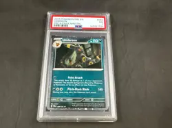 2025 POKEMON PRISMATIC EVOLUTIONS UMBREON PRE 8 PACK MINI TIN PSA 7 - Image 1