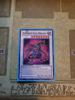 YUGIOH TCG HUNDRED EYES DRAGON DPC5-EN003 SUPER LIMITED EDITION NM - Image 1