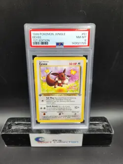 1999 POKEMON JUNGLE EEVEE 1ST EDITION NON-HOLO 51/64 PSA 8 NM-MT WOTC - Image 1