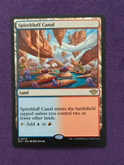 Spirebluff Canal Outlaws of Thunder Junction Regular NM MTG - Image 1