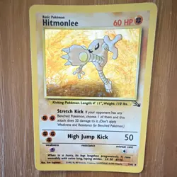 Pokemon TCG Hitmonlee Holo Rare Fossil 7/62 Unlimited 1999 Card English - Image 1