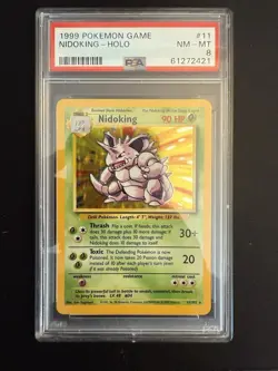 1999 POKEMON BASE SET UNLIMITED #11 NIDOKING-HOLO PSA 8 - Image 1