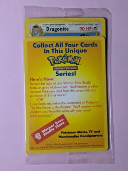 Dragonite Pokemon Sealed WB Gold Stamped 1999 First Movie Black Star Promo - Image 1