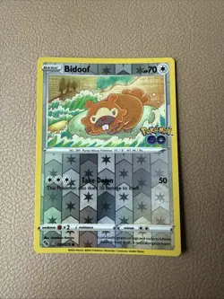 Pokemon Bidoof 059/078 Pokemon GO Peelable Ditto Reverse Holo 70HP Common EN - Image 1