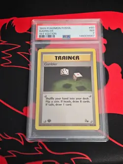 1999 POKEMON FOSSIL 1ST EDITION #60 GAMBLER PSA 7 - Image 1