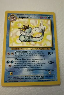 Pokemon TCG Vaporeon Jungle 28/64 Regular 1999-2000 Wizards Base Set Copyright - Image 1