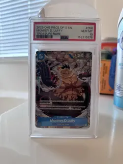 2025 ONE PIECE OP13-058 MONKEY D. LUFFY TREASURE RARE PSA 10 GEM MINT - Image 1
