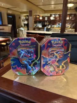 Pokemon TCG: Mega Charizard X & Mega Charizard Y Tin Set Of 2 SEALED IN HAND new - Image 1