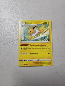 1x Volteon Holo Rare Sword & Shield Vivid Voltage Pokemon 047/185 LP - Image 1