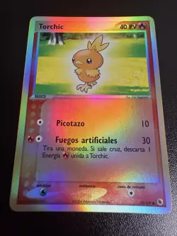 SPANISH Torchic 73/109 Reverse Holo EX Ruby and Sapphire 2004 Pokemon Card - Image 1