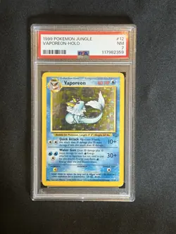 1999 POKEMON JUNGLE #12 VAPOREON-HOLO PSA 7 - Image 1