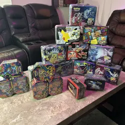LOT OF 12 Pokemon TCG Collector's Chest and 6 Pokemon Mega Charizard EX Tins - Image 1
