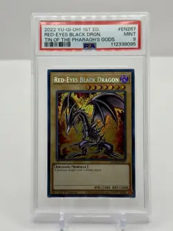 2022 YUGIOH! 1st ED. Red Eyes Black Dragon Tin Of The Pharaoh's Gods PSA 9 Mint - Image 1