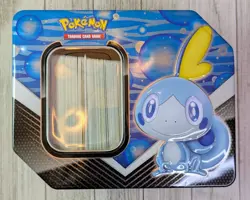 Pokemon Tin Box with Assorted Reverse-Holo And Non-Holo Cards - Image 1