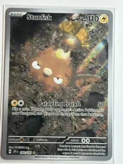 Stunfisk - SV08: Surging Sparks 202/191 NM Pokemon Card - Image 1
