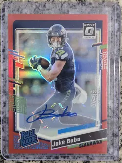 2023 Panini Donruss Optic Rated Rookie Jake Bobo Red Auto /75 Seahawks #288 RC - Image 1