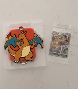 Chinese Charizard Keychain And Sealed Promo Card - Image 1