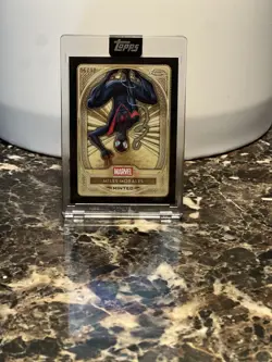 2025 Topps Marvel Mint Miles Morales Encased /10 - Image 1