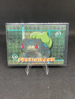 BULBASAUR (FUSHIGIDANE)--JAPANESE MEIJI EMBOSSED PROMO FOIL POKEMON CARD - Image 1