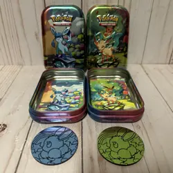 Pokemon TCG Prismatic Evolutions Glaceon & Leafeon Tin Set With Art Card & Coin - Image 1