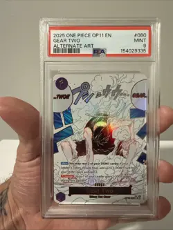 2025 ONE PIECE OP11-A FIST OF DIVINE SPEED #080 GEAR TWO ALTERNATE ART PSA 9 - Image 1