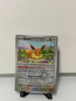 Pokemon Prismatic Evolutions Reverse Holo 074/131 Eevee - Image 1
